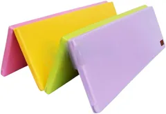 A folding mattress standing part open in a zigzag, its panels pink, yellow, green and lilac.