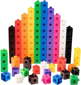 Interlocking plastic cubes stacked into ten columns of different colours forming a bar chart, with loose cubes scattered in front.