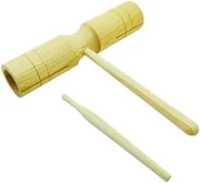 A pale wooden tone block with two slots, lying beside its plain wooden beater.