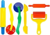 Six dough tools laid out in a row: a blue-handled rolling pin, a wavy cutter, a pizza wheel, a knife, a shaping tool and a red patterned roller.