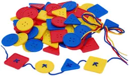 Plastic buttons in red, yellow and blue, round, square and triangular, some threaded onto laces.