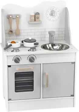 A grey and white play kitchen with a white tiled splashback, a clock, a steel sink and tap, a hob, an oven with a glass door and hanging utensils.