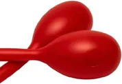 A pair of red plastic maracas lying crossed, handles toward the viewer.