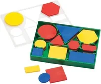 Plastic attribute blocks -- circles, squares, triangles, hexagons and rectangles in red, yellow and blue -- in a green tray.