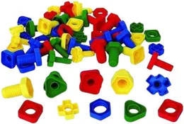 A heap of oversized plastic nuts and bolts in red, blue, green and yellow, the nuts moulded as circles, squares, hexagons and flowers.