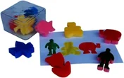 Sponge shapes including a star, a bear, a car and a human figure, in red, blue, yellow and green, some in a clear box and the rest on a sheet of paper.