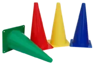 Four plastic skittle cones in green, red, blue and yellow.