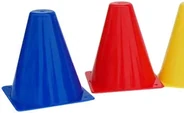 Short plastic marker cones on square bases in blue, red and yellow.