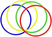 Four plastic rings in blue, yellow, green and red, laid overlapping.