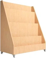 A birch book display on castors whose face is a staircase of four sloping shelves, deepest at the bottom, for picture books to stand cover outward.