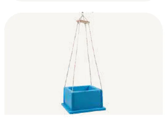 A small blue box seat hung from four cords.