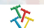 Four T shaped chew tools in green, red, blue and yellow.