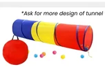 A blue, yellow and red fabric play tunnel with a red carry bag.