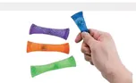 Four woven mesh marble fidgets, one held in a hand.